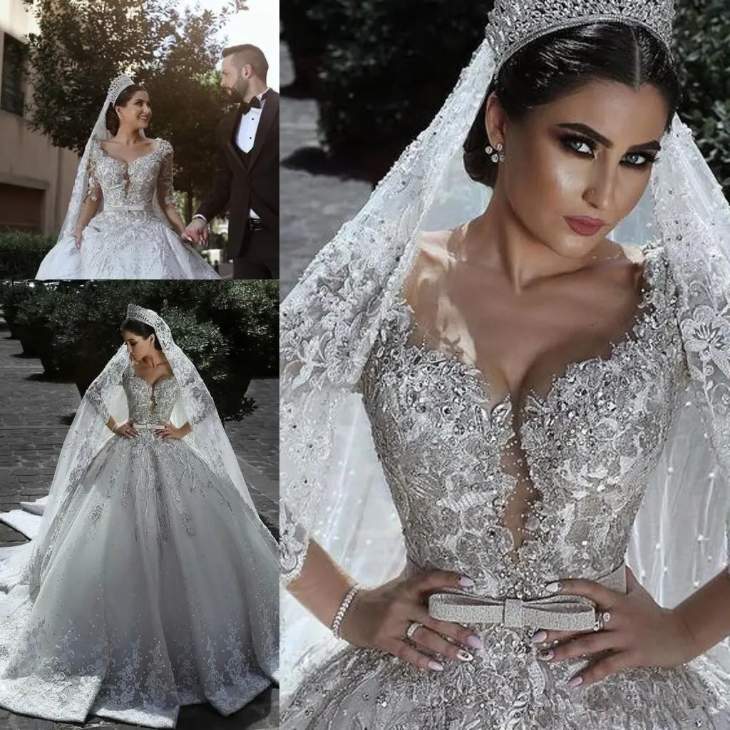 Luxurious Arabic Ball Gown Wedding Dresses 2019 Glamorous Long Sleeves Tulle Appliques Beaded Sequins church train Fitted Bridal Gowns