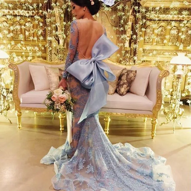 Stunning Sexy Backless Prom Dress Jewel Neck Beads Lace Applique Fabulous Bow Evening Dress See Through Tulle Mermaid Prom Dress Cheap Gown