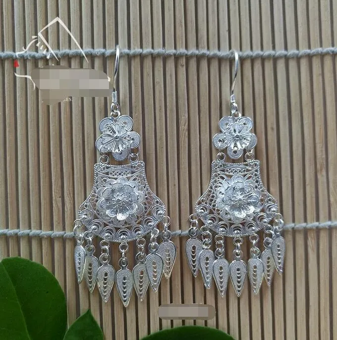 Miao Alai silver jewelry 999 sterling silver earrings Hmong hand drawing creative dream catcher earrings female ethnic style gift