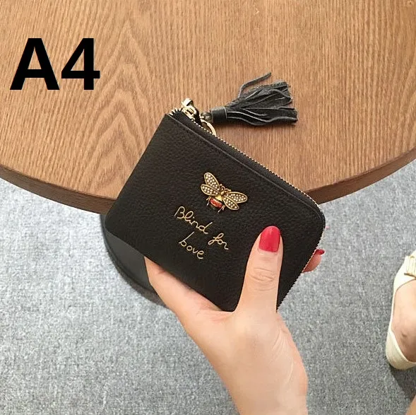 Women`s wallet Rectangle Genuine leather Soft cowhide Women`s billfold Zero purse Small Checkbook. Wallets. Card bag. honeybee. Short E22134