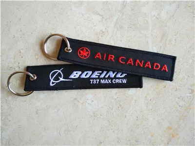 Air Canada Boeing 737 Max Crew عرف التطريز سلاسل المفاتيح مع الحدود ميرو 13 × 2.8cm 100pcs الكثير