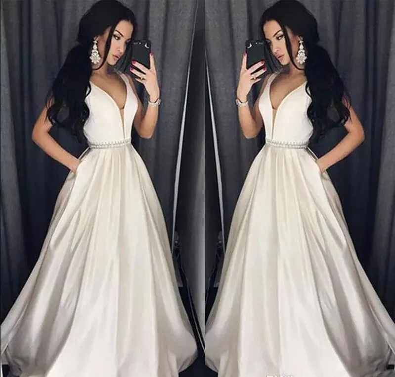 Elegancki Plus Size Prom Sukienki z kieszeniami Pasek Zroszony Pasek A-Line Deep V Neck Długość Długa Formalna Sukienka Suknia Wieczorowa Koraliki Szata De Soiree