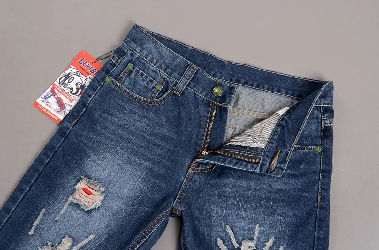 Partihandel-2018 Straight Mäns Jeans Ripped Frayed All-Match Ungdom Pop Skinny Jeans Man Höst Vinter Bomull Casual Hole Byxa Gratis frakt