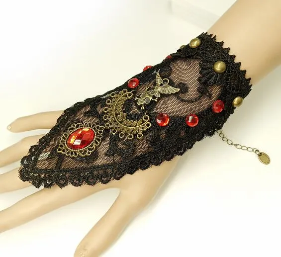 Kostenlose neue Gothic Punk Vintage Handverzierungen Geisterkopf Dame schwarzes Spitzenarmband modische Persönlichkeit klassisch zarte Eleganz