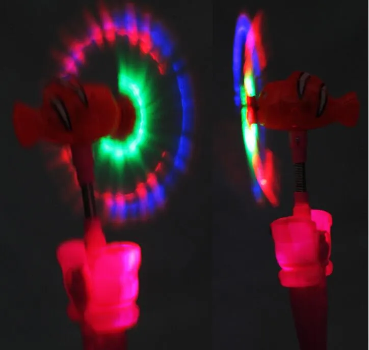 Electric Clown Fish Projection Wand With Rotating Glow Stick And Star  Flashing Lights Light Up Musical Toys For Flawless Sky Illumination From  Qin88888, $6.55