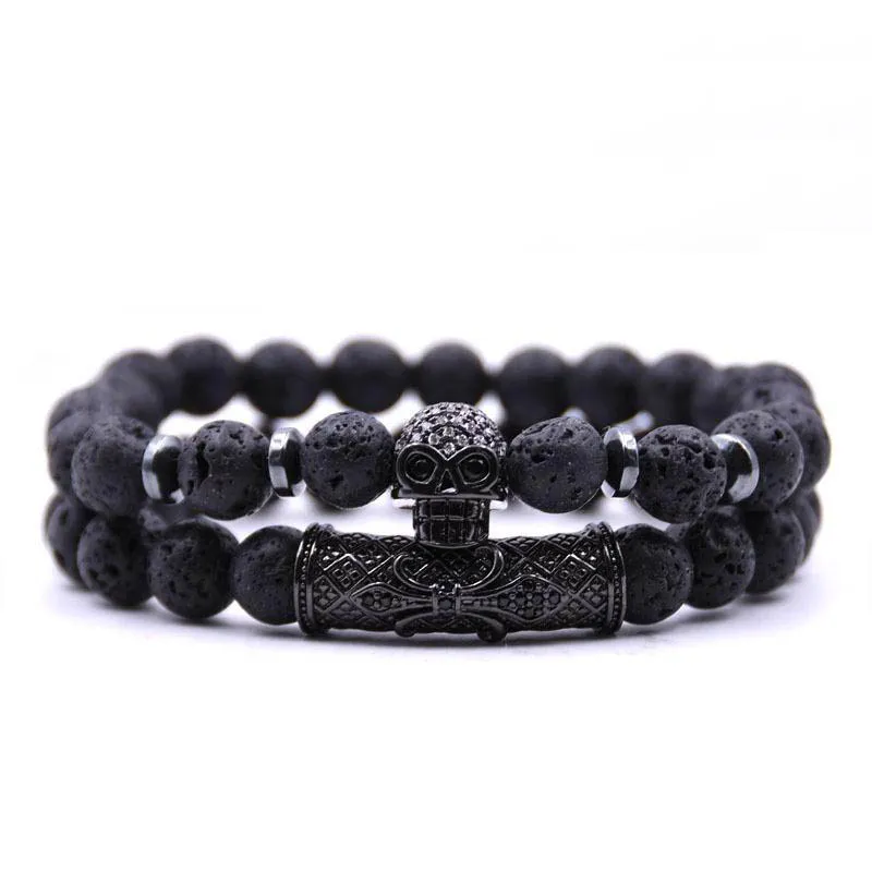 Varm försäljning 2st / set svart färg skalle huvud lava turkos natursten pärlor män armband smycken set charm armband