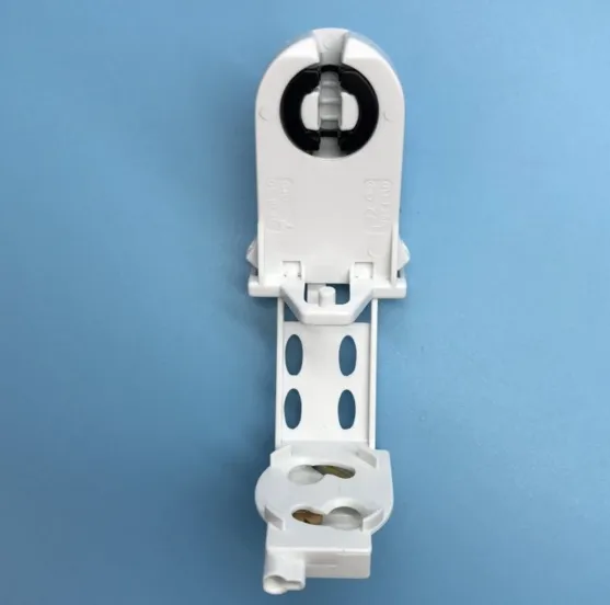 Fluorescent lamp holder bracket clearance