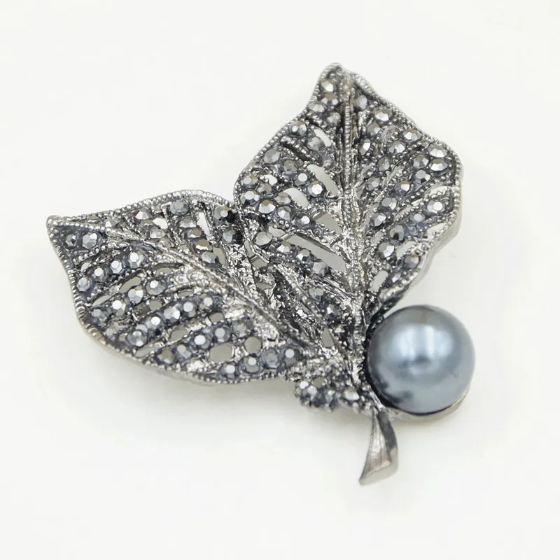 Broche en cristal noir de haute qualité, jolie feuille élégante, bijoux incroyables, accessoires de vêtement pour femmes, offre spéciale