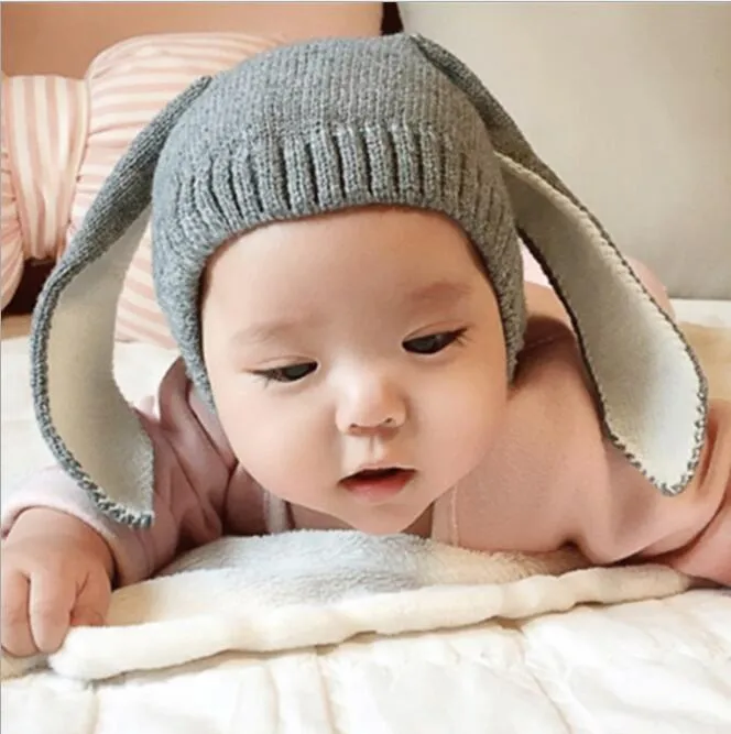 冬の赤ちゃんのウサギの耳の帽子ニット帽子幼児のための子供のための幼児のバニーキャップ0-2 atガール男の子の帽子写真小道具幼児温身ビーニー