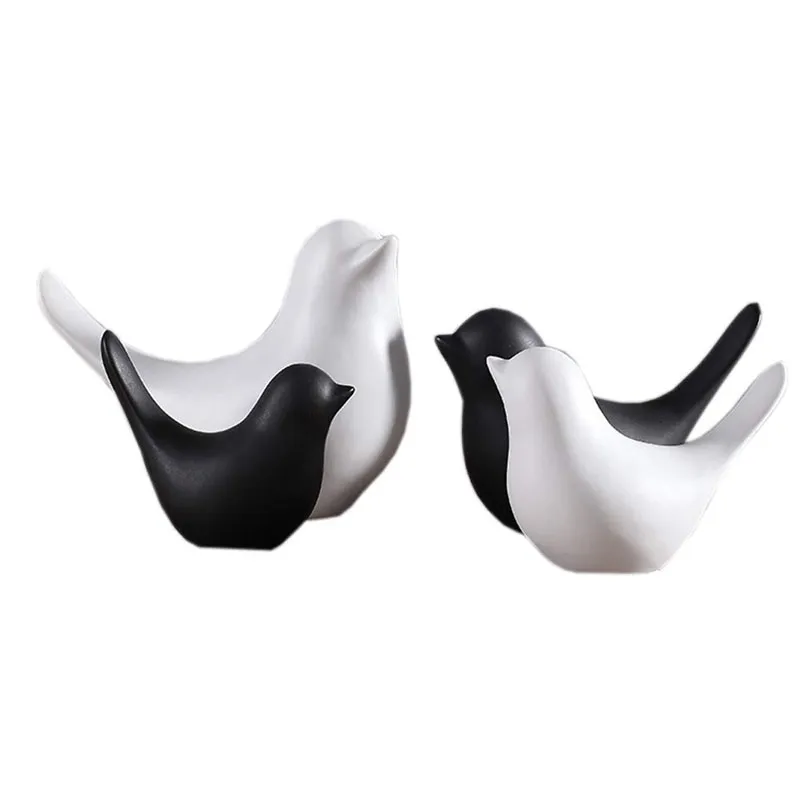 Figurine di uccelli in ceramica in bianco e nero. Uccelli da collezione, decorazioni artigianali, moderni e minimalisti, scandinavi, per la casa, ornamenti per matrimoni