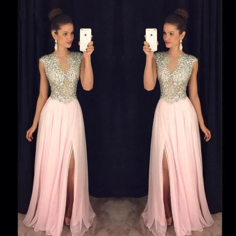 2018 Long Bling Prom Dresses Cap Sleeves Illusion Sparkly Crystal Pärlor Royal Blue Pink Side Split Sheer Back A Line Party Evening Gowns