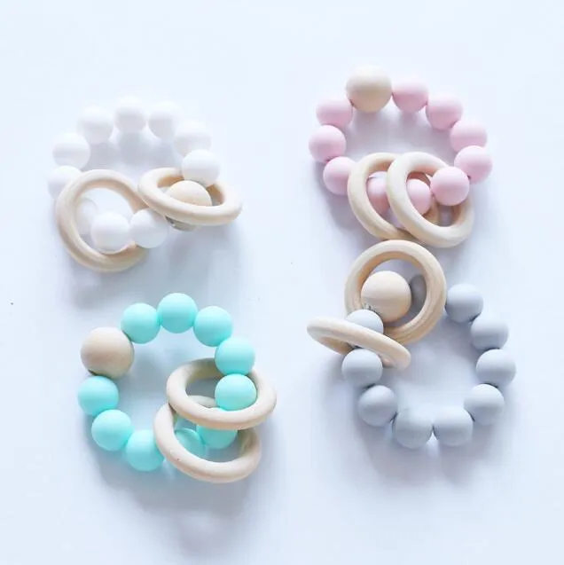 50pcs 아기 Teether 반지 음식 학년 실리콘과 너도밤 나무 나무 나무 젖꼭지 반지 팔찌 실리콘 Teethers 씹는 장난감 샤워 선물 BPA 무료 ye019