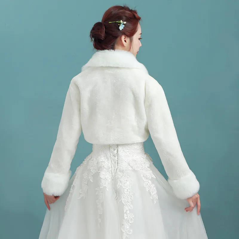 2018 vendita calda color avorio senza maniche di alta qualità in pelliccia sintetica bolero cappotto giacche da sposa giacche da sposa spedizione gratuita