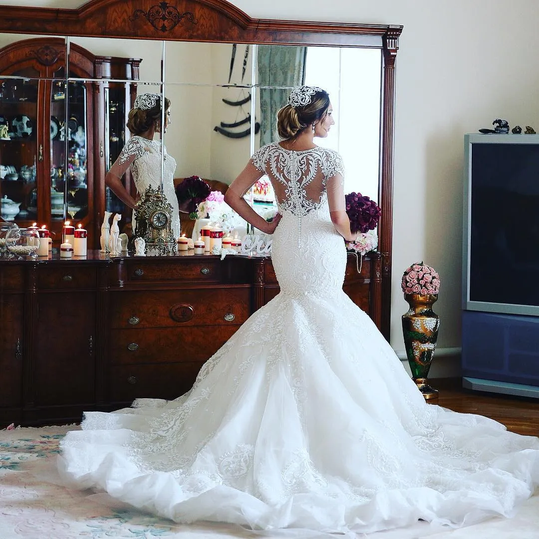 Elegant Dubai Mermaid Wedding Dress Jewel Neck Half Sleeve Beads Lace Applique Bridal Dress Charming Africa Arabia Tulle Long Wedding Gowns