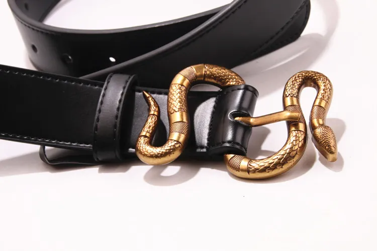 Hete zwarte kleur luxe hoogwaardige koeienhuiddesigner riemen mode slangenspen gesp geworden lederen riem heren dames riem ceinture riem