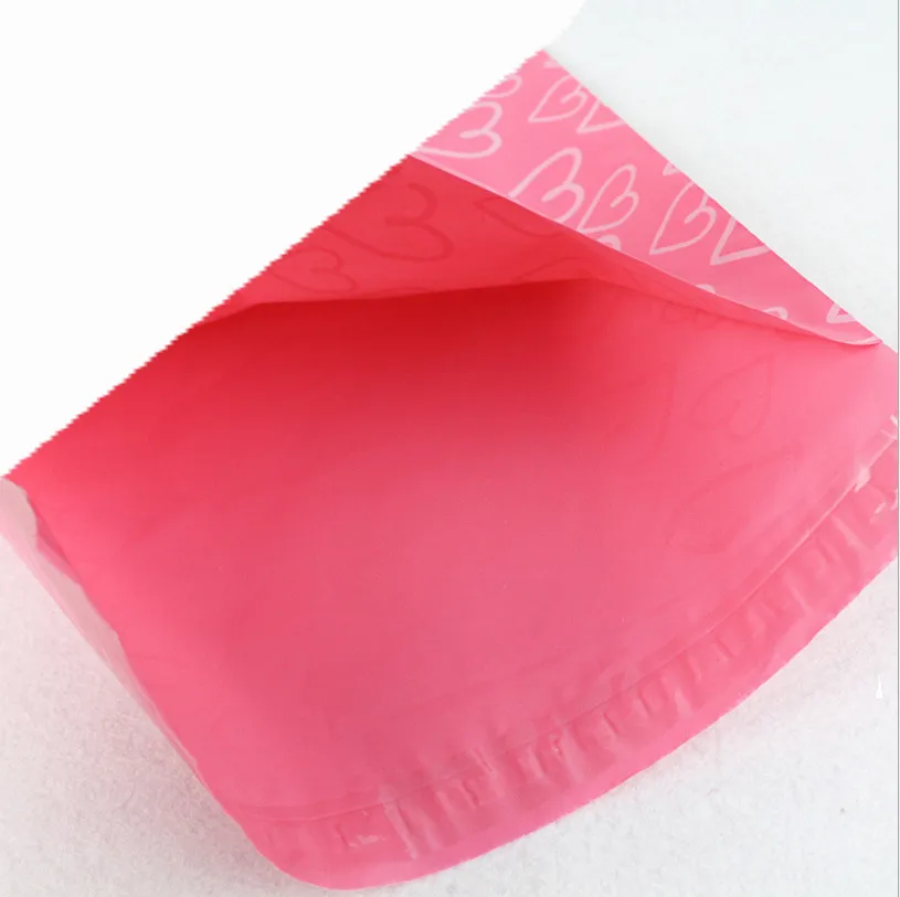 100 stks / partij Roze Poly PE Mailer Express Tas 28 * 42 cm Mail Bags Love Heart Envelop Self-Seal plastic zakken voor sieraden meisjes product