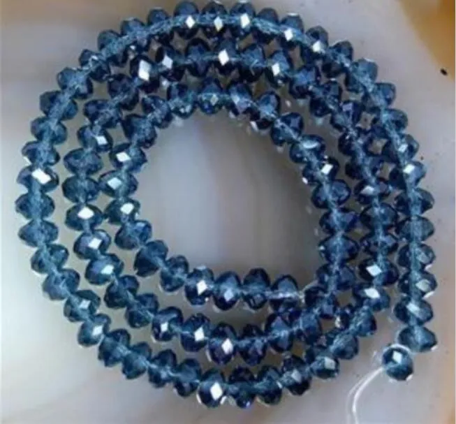 Perline sfuse con gemme tonde sfaccettate in cristallo di inchiostro blu da 4x6 mm
