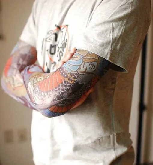 Ny ankomstmix elastisk falsk tillfällig tatuering hylsa 3d konstdesigns kropp arm ben strumpor tatuering coola mänkvinnor shippi9710895