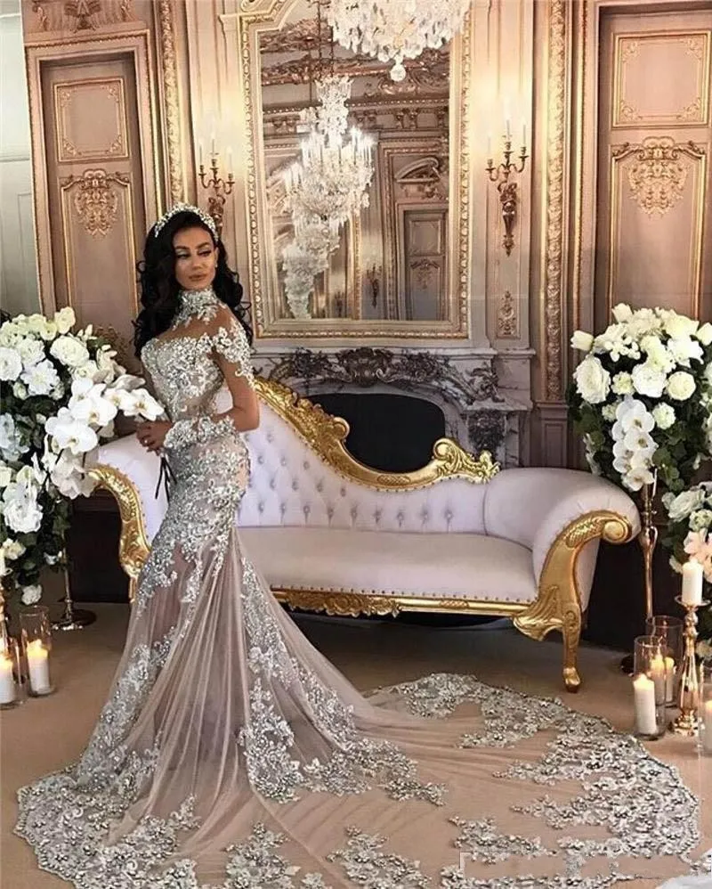 Luxe arabe Dubaï col haut robe de mariée sirène argent perlé manches longues illusion dentelle appliques dos nu tribunal train robe de mariée