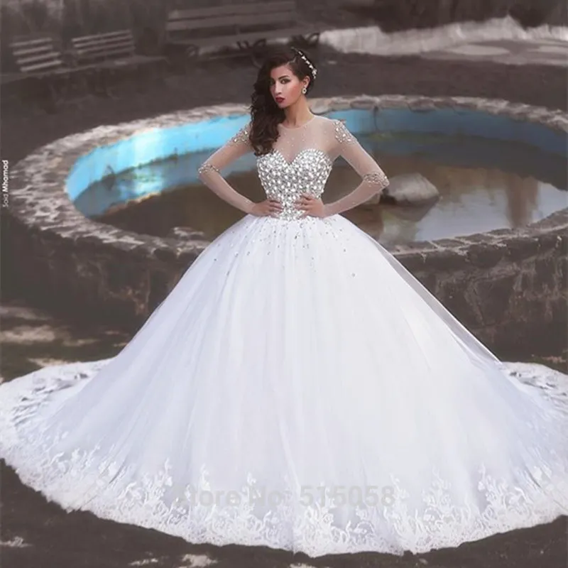 Abito da sposa arabo a maniche lunghe trasparente di lusso Cristalli Perle di perline Principessa Abito da ballo in tulle gonfio Abiti da sposa con applicazioni in pizzo Abiti da sposa da donna taglie forti