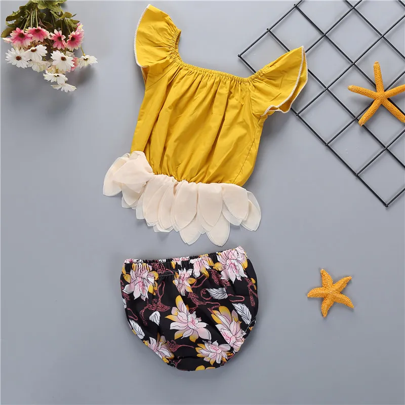 新生児の赤ちゃんの女の子の服セット2018夏の子供の女の子の服フライスリーブパッチワークの上部+花のショートパンツズボンブルーマーズ女の子服セット