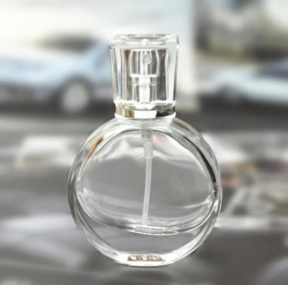 25mlクリアガラスの空の香水びんの噴霧器のスプレーの詰め替え可能なボトルスプレーの香りのケース携帯用漏斗