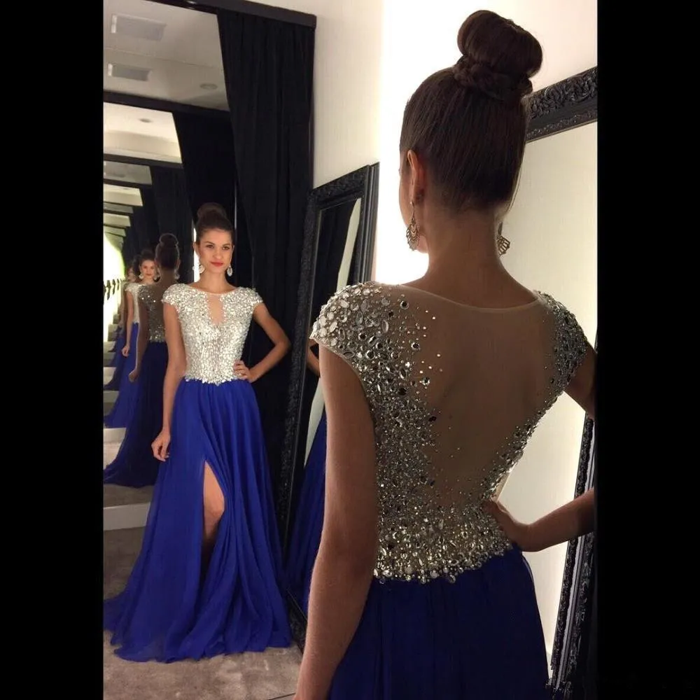 2018 Long Bling Prom Dresses Cap Sleeves Illusion Sparkly Crystal Beads Royal Blue Pink Side Split Sheer Back A Line Party Evening Gowns