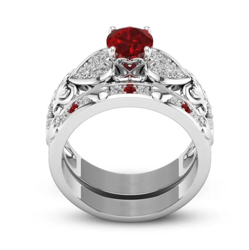 Partihandel gratis frakt mousserande lyx smycken 925 sterling silver röd ruby ​​cz diamant ädelstenar kvinnor bröllop brud hjärta ring set present