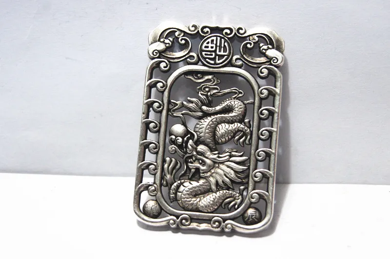 Antique white bronze double-sided dragon play ball lucky word. Rectangular lucky necklace pendant.