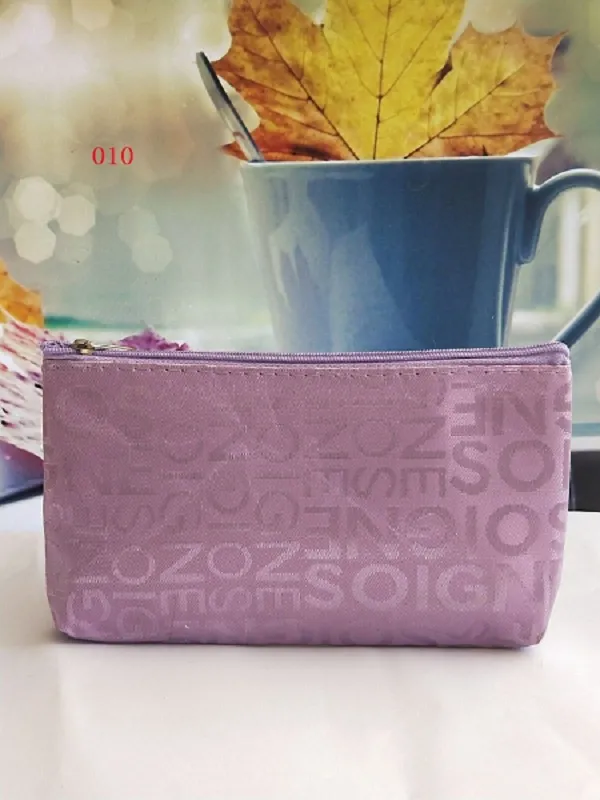 Nuova borsa cosmetici con lettere minuscole Borsa trucco coreana femminile Pacchetto di archiviazione necessario il viaggio Regali promozionali popolari