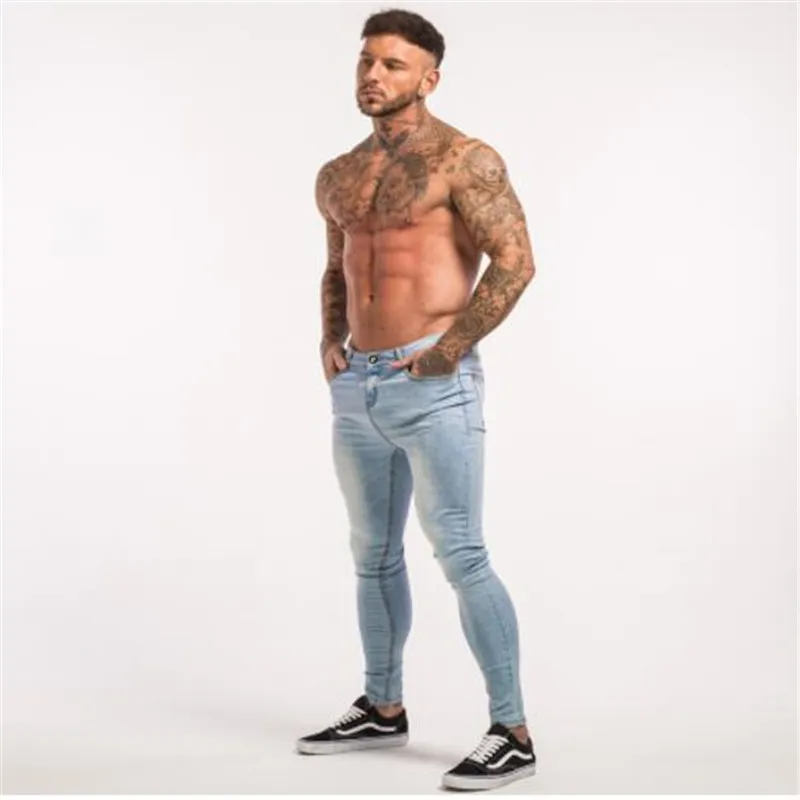 Jeans delgados para chicos Jeans estiramientos de mezclilla azul claro de mezclilla para hombres de pantalones ajustados