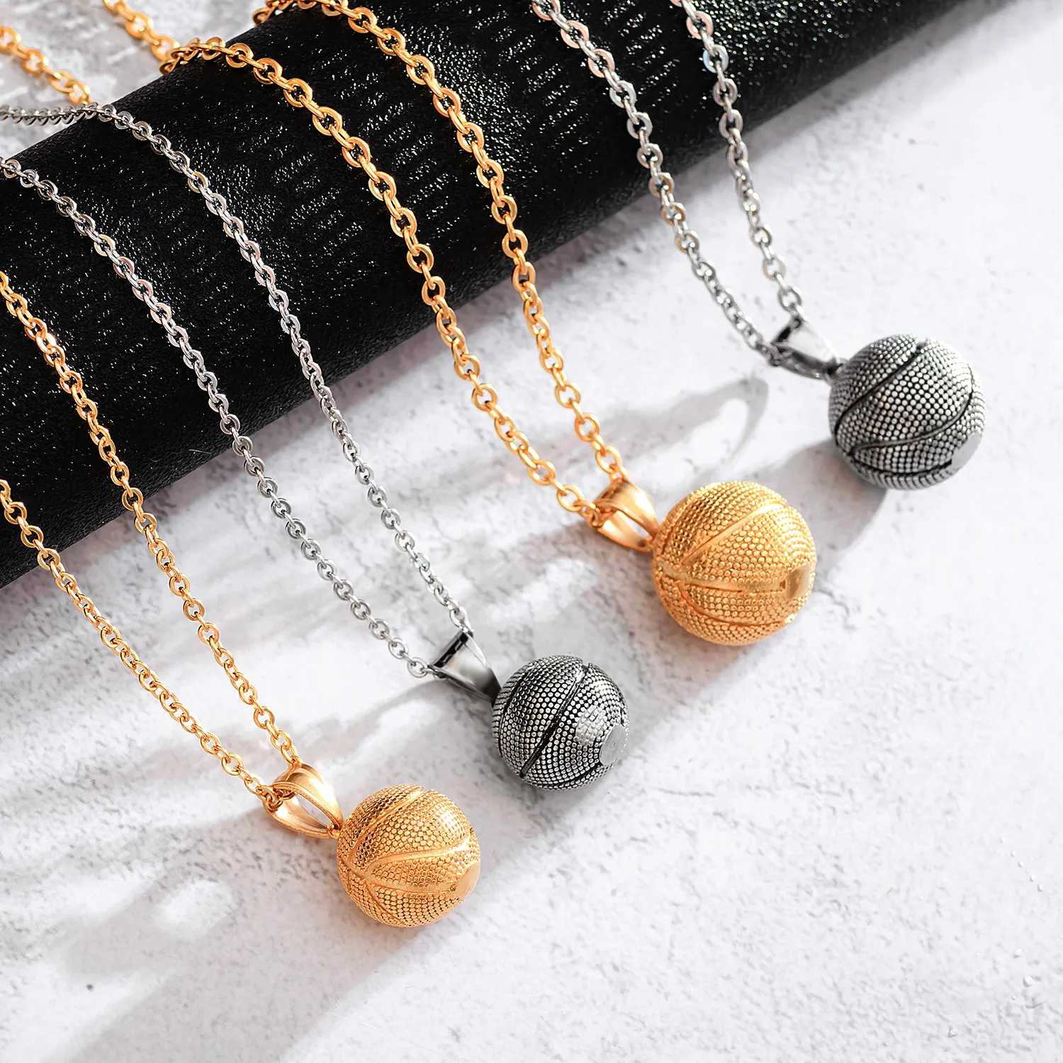 Gold necklace discount with basketball charm