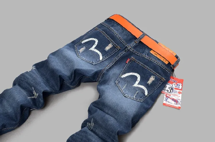 Partihandel-2018 Straight Mäns Jeans Ripped Frayed All-Match Ungdom Pop Skinny Jeans Man Höst Vinter Bomull Casual Hole Byxa Gratis frakt