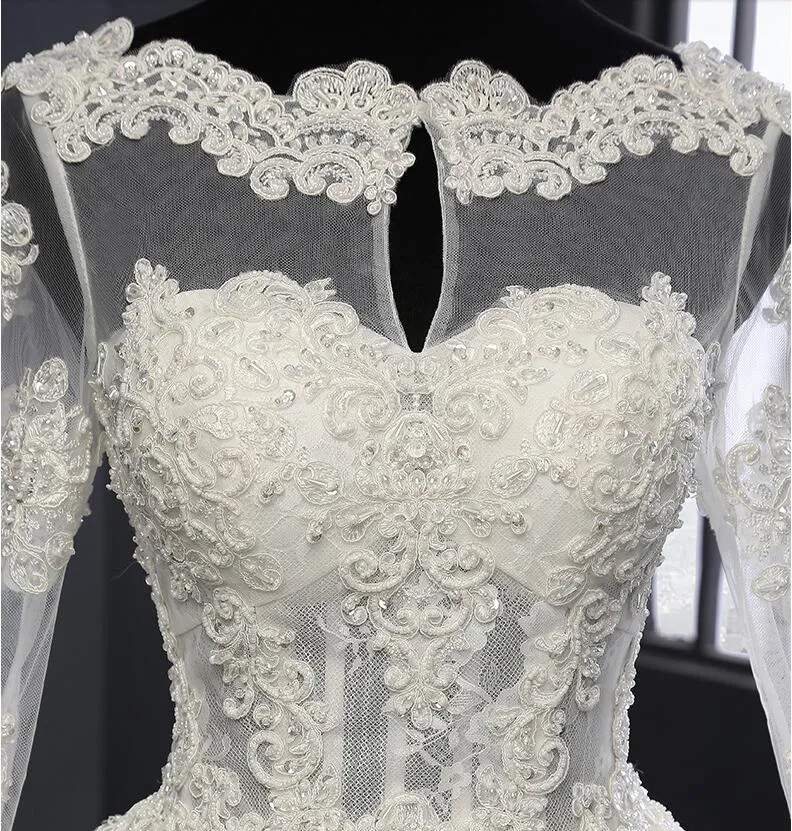 Beżowa nowa suknia ślubna koronkowa sukienka ślubna na ramię z długim rękawem.