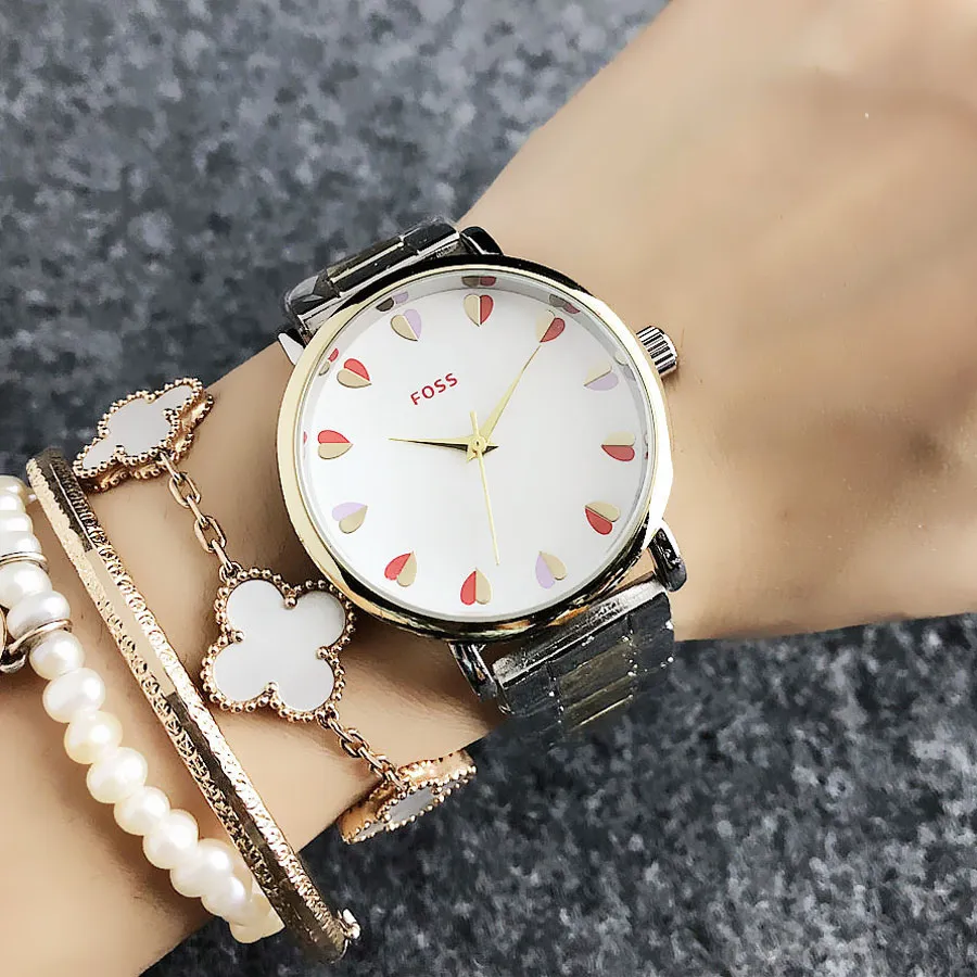 Mode FOSS marque femmes fille en forme de coeur style acier bande de métal montre-bracelet à quartz FO 04
