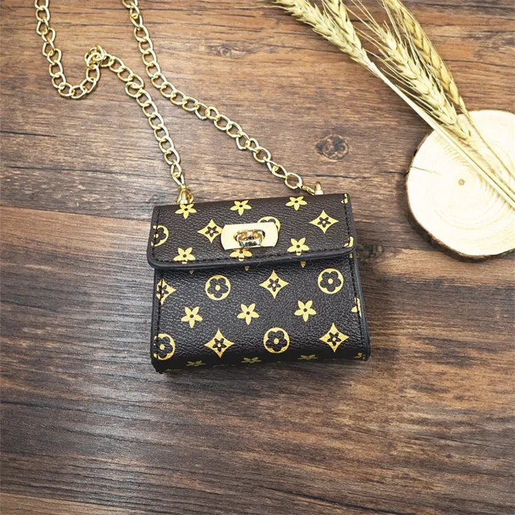 Portmonetki dziecięce dziecięce PU Skórzane worki do kratki Księżniczka Camellia Cekiny Kwiatowe Hangbag Moda Koreański Dzieci Mini Cukierki Chain Torba 5 Kolory