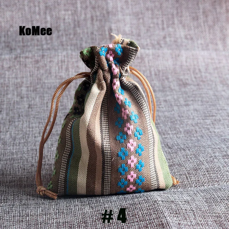 Nuevas bolsas 50 Uds. Bolsas de regalo de joyería con cordón de la tribu Tribal a rayas multicolores tela de algodón estilo étnico chino 9x13cm5267344