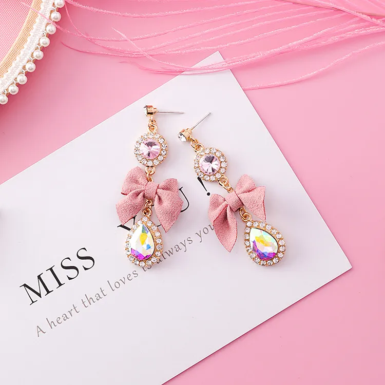 2018 Nieuwe Koreaanse versie van de roze boog hanger oorbellen vrouwelijke modellen strass hanger oorbellen mode-sieraden zoete cadeau detailhandel