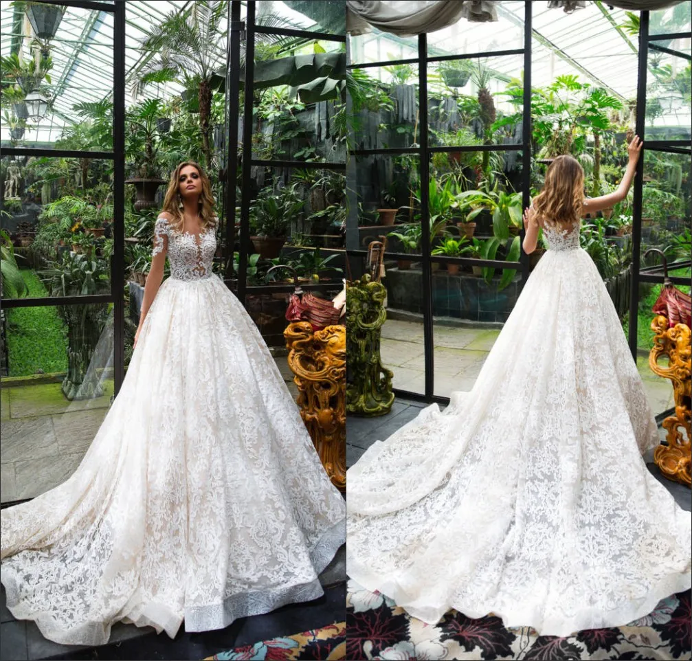 Sheer Långärmade Gorgeous Bröllopsklänningar 2022 Ny Långt tåg Vintage Lace Arabiska Dubai Brudklänningar Anpassad unik Vestido de Novia