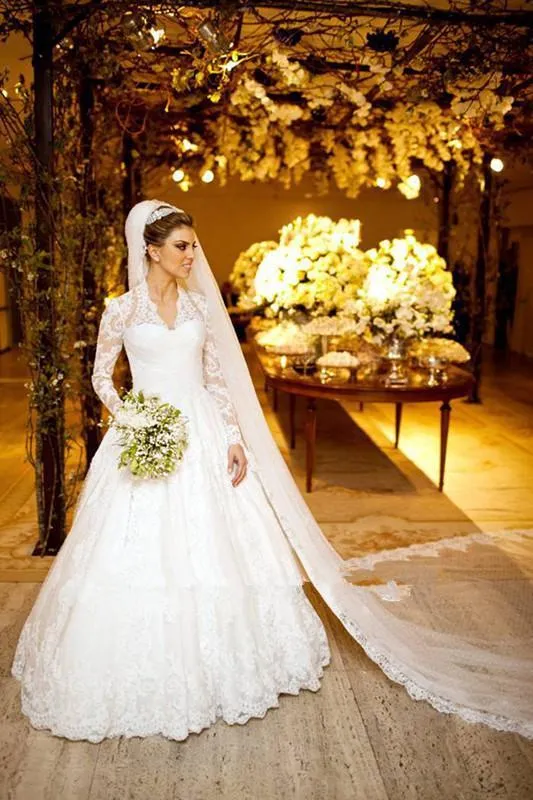 Abiti da sposa eleganti e stupefacenti a maniche lunghe in pizzo con applicazioni a trapezio 2018 con abiti da ricevimento con strascico a cappella Abiti da sposa 93