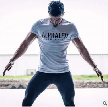 Homens Fitness Running Camisetas Rápida Drea Manga Curta Esporte Camiseta com Carta Impressa Treinamento de Ginástica Ao Ar Livre Roupas Sportswear