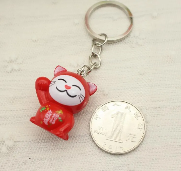 2018 Nyckelkedja Lovely Cartoon Maneki Neko Lucky Cat Mini Plastic Toy Keychain för Barngåva Purse Charms Pendant Key Ring