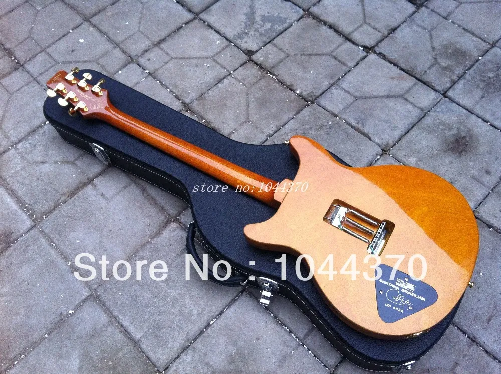 Nuovo arrivo SANTANA Modello di chitarra elettrica gialla scoppiata con custodia 20187131220