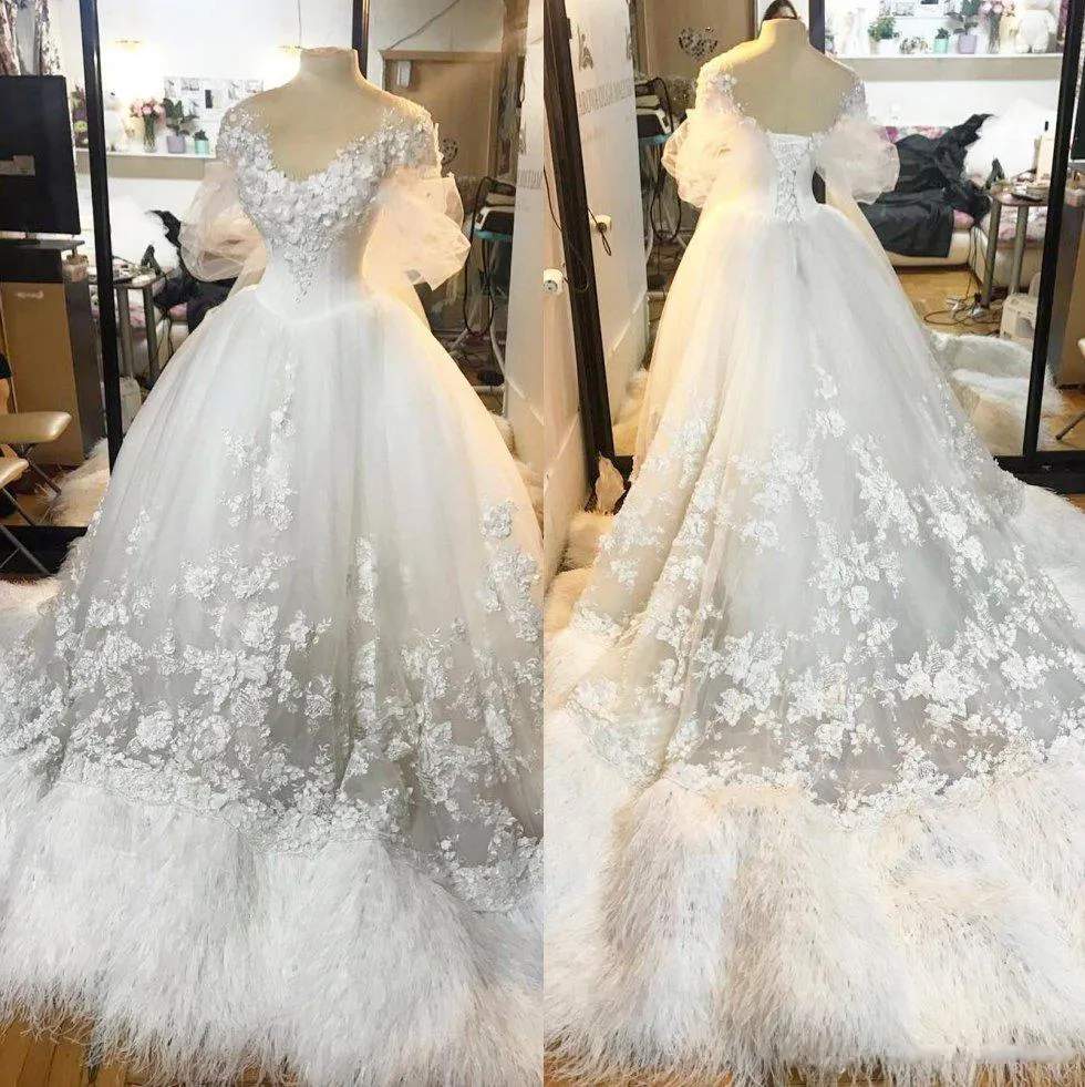 Gorgeous Feather Wedding Dresses 2018 Lace Appliques Sheer Short Sleeves Bridal Gowns Lace Up Back Sweep Train Saudi Arabic Wedding Vestidos