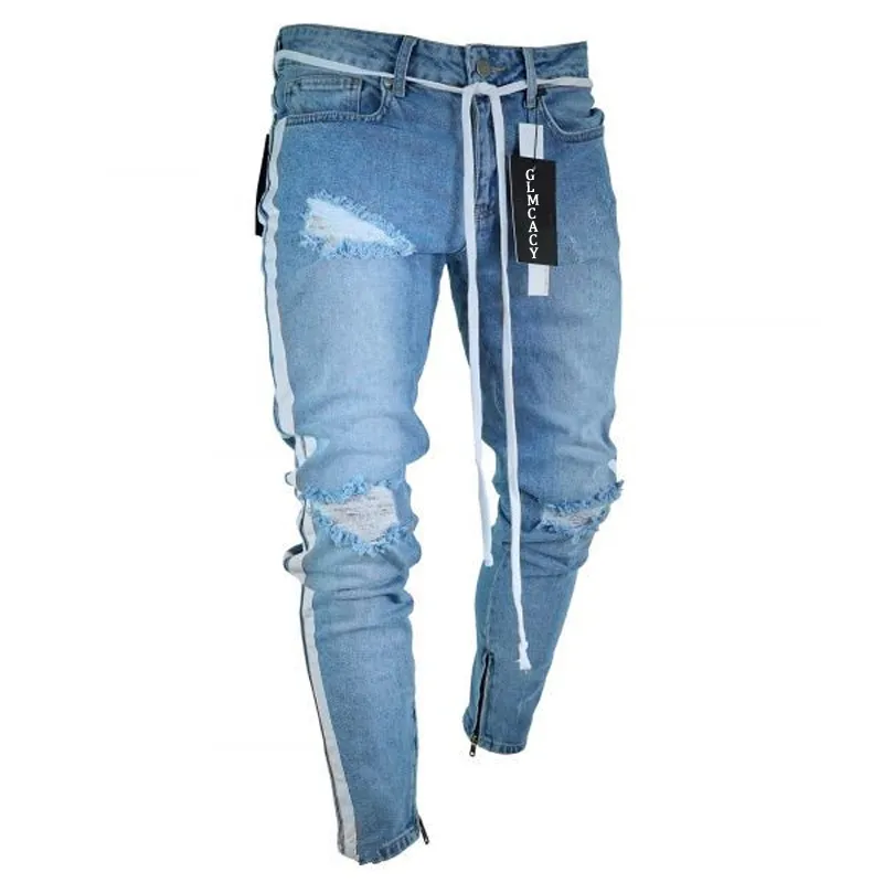 Jeans con sales buchi laterali