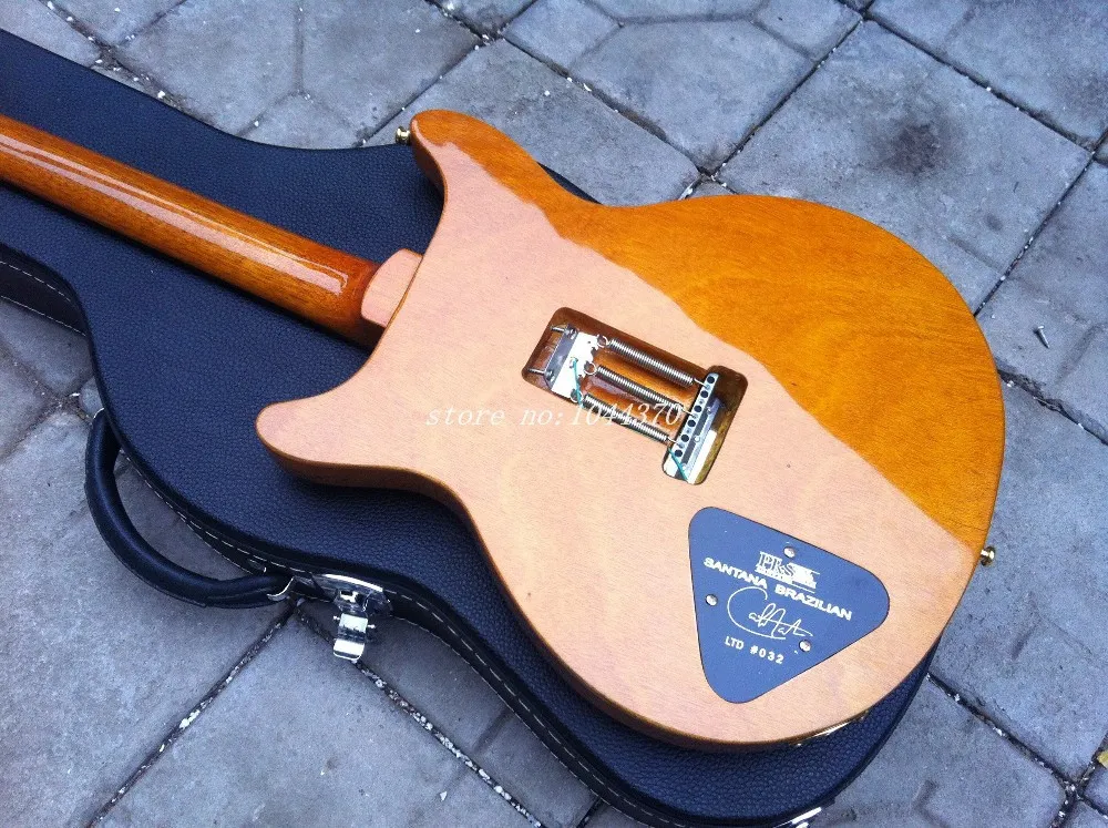 Nuovo arrivo SANTANA Modello di chitarra elettrica gialla scoppiata con custodia 20187131220