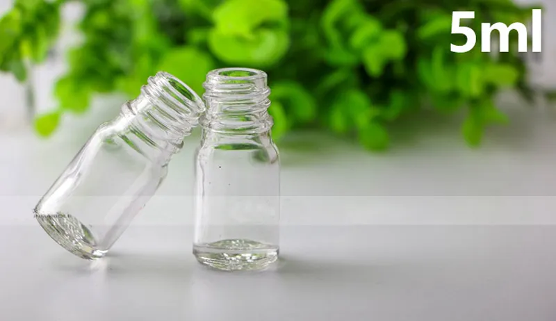 Bouteille compte-gouttes transparente en verre vide en gros 5 ml bouteille liquide en verre E avec bouchon à l'épreuve des enfants en or et pipette à vendre