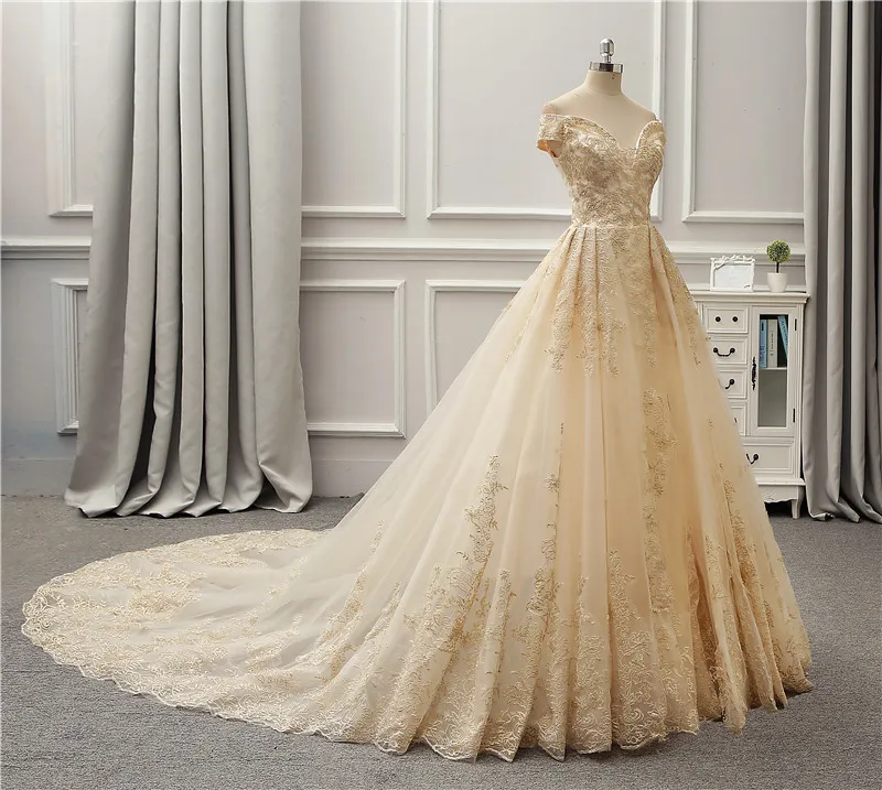 Abiti da sposa champagne con spalle scoperte con ricami Abiti da sposa fantasia a trapezio Abiti da sposa su misura con lacci sul retro