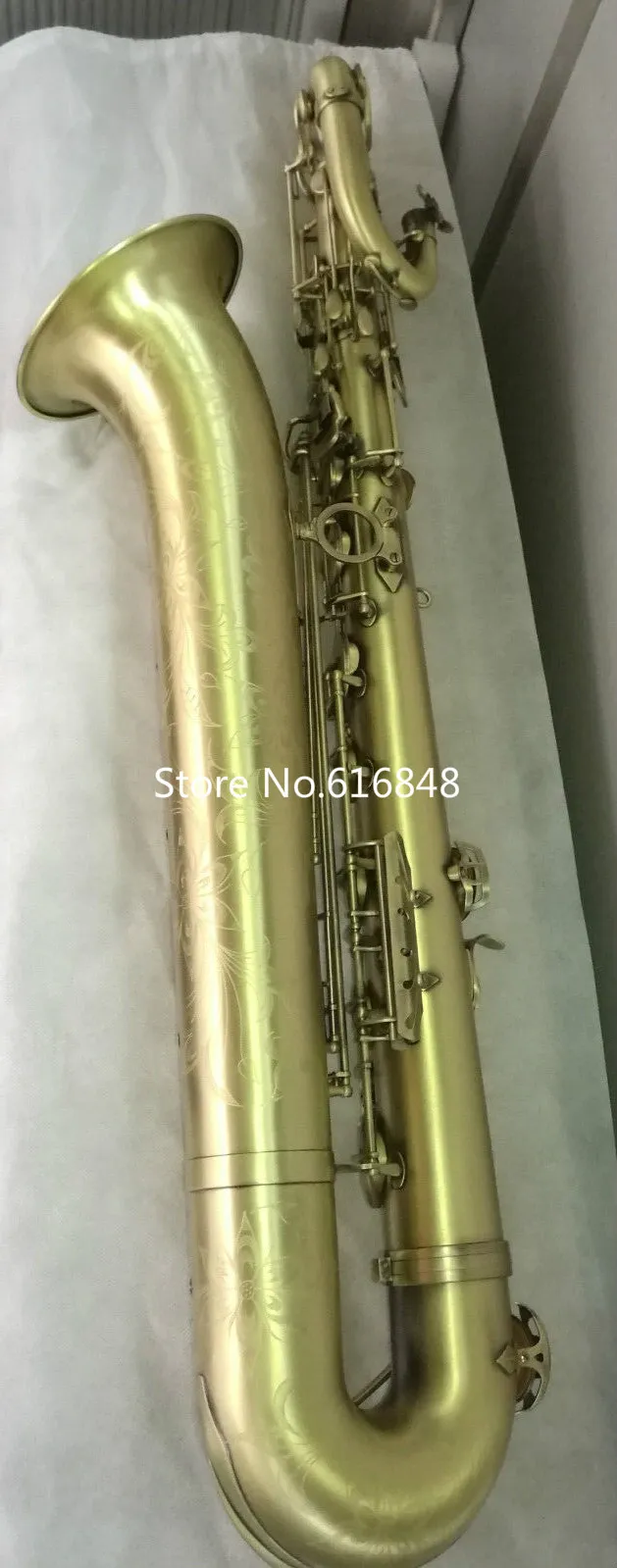新しい到着ブランドBaritone Brass Tube Saxophoneユニークなビンテージ銅の表面Eケースが付いている平らな楽器はカスタマイズできますロゴ