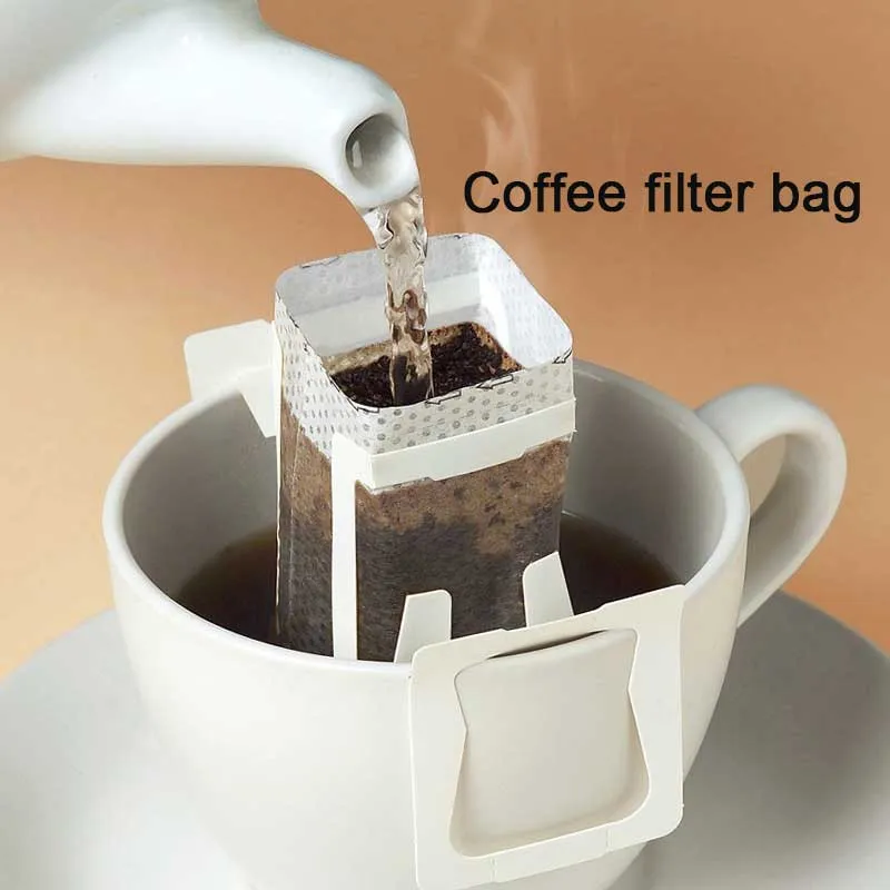 100pcs / pack goutte à café fil filtre sac portable style oreille style de café filtres de papier de bureau maison de bureau de bureaux de baisse du café et des outils de thé